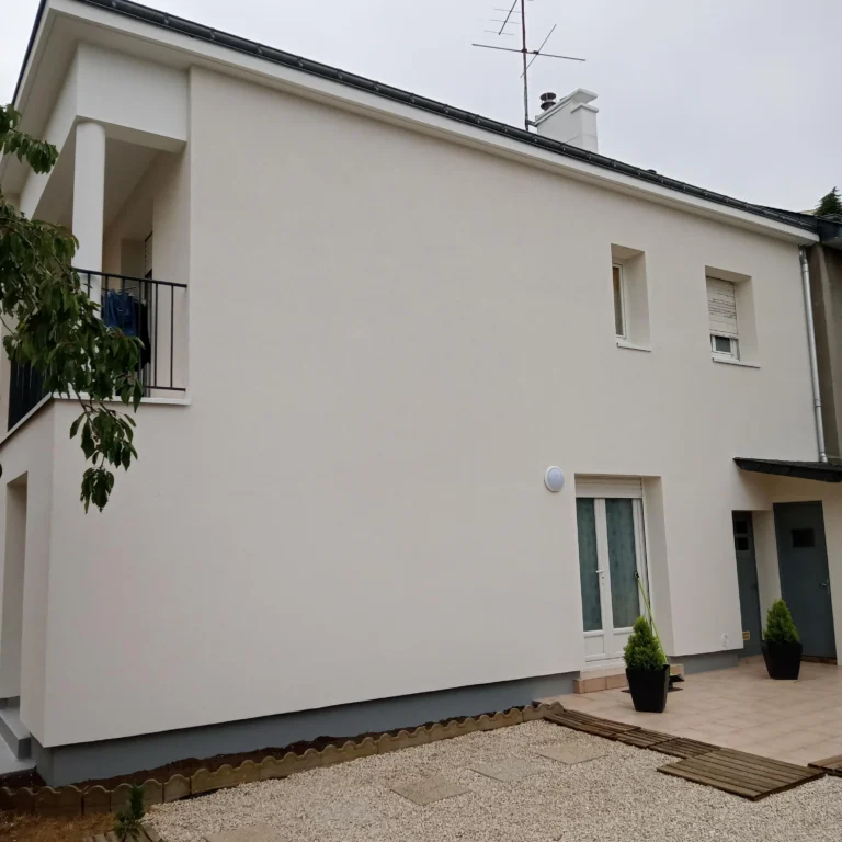 ITE enduit finition talochée